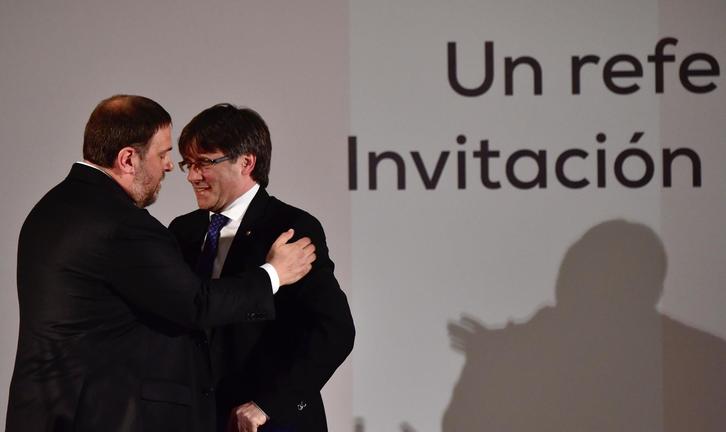 Junqueras y Puigdemont, en una imagen de archivo. (Gerard JULIEN/AFP)