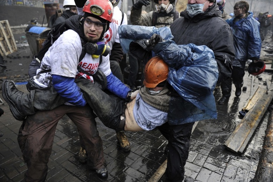 Muchos de los manfiestantes habrían fallecido por disparos de las fuerzas policiales. (Louisa GOULIAMAKI/AFP)