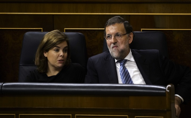 Sáenz de Santamaría y Rajoy, en una comparecencia anterior. (Dani POZO /AFP)