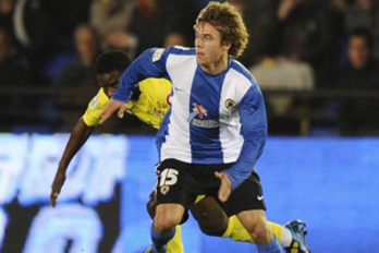 Kiko Femenía, con la camiseta del Hércules.