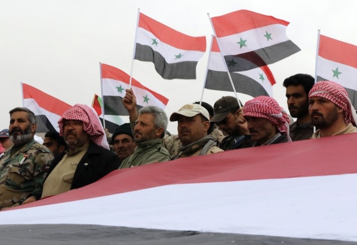Voluntarios oficialistas de Siria. (LOUAI BESHARA / AFP) 
