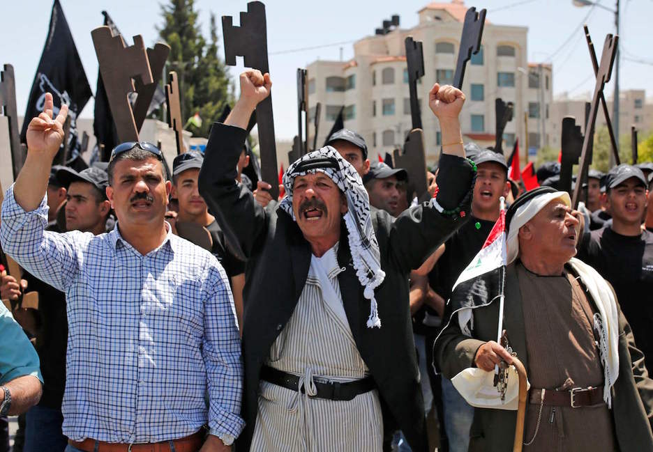 El pueblo palestino ha marchado hacia la tumba de Yaser Arafat. (Abbas MOMANI / AFP)