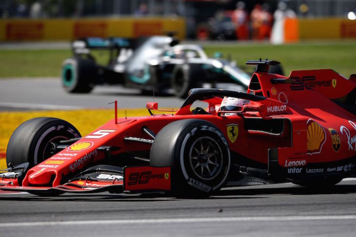 Sebastian Vettel ha liderado la carrera ante Hamilton, pero la victoria ha sido para el inglés. (Chales COATES/AFP)