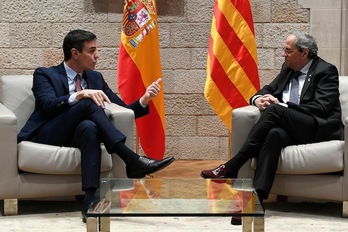 Sánchez y Torra, en Palau esta mañana. (Josep LAGO | AFP)