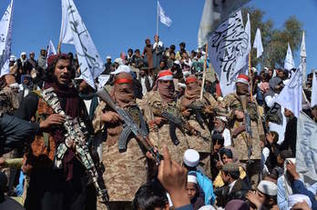 Talibanes celebran el acuerdo con EEUU el pasado 2 de marzo. (Oorulah SHIRZADA /AFP)