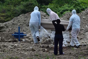 Un entierro en Honduras. (Orlando SIERRA/AFP)