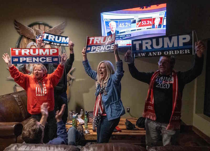 Simpatizantes de Trump en Michigan, uno de los estados claves. (Seth HERALD | AFP)