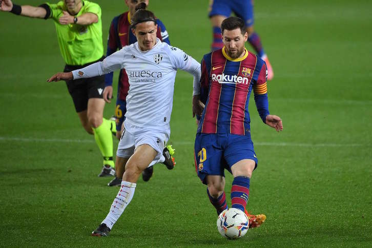 Leo Messi, que metió dos goles en el último partido contra el Huesca, puede jugar su último partido en Anoeta. (Lluis GENE/AFP)