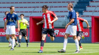 Plantilla y cuerpo técnico del juvenil de División de Honor del Athletic celebra el triunfo. (@AthleticClub)