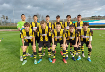 Once del Basconia en la victoria ante Pasaia.