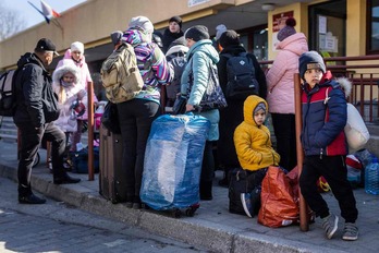 Familias de refugiados en la frontera de Polonia. 