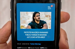Un mensaje en un teléfono móvil sobre la ejecución de Majidreza Rahnavard.