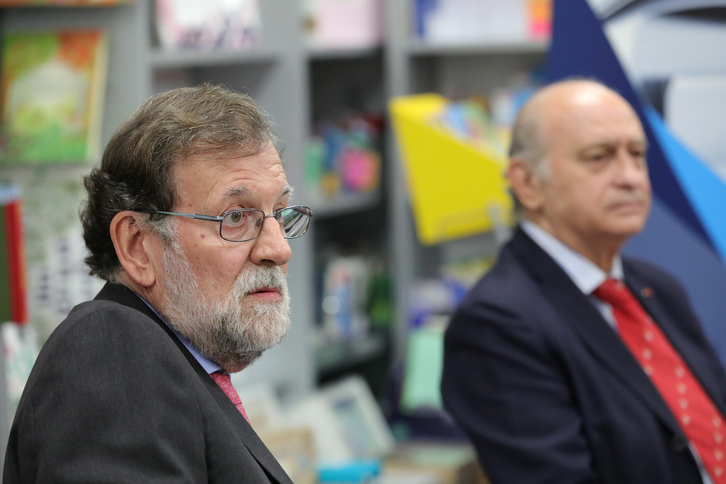 Mariano Rajoy y Jorge Fernández Díaz durante la presentación del libro del exministro.