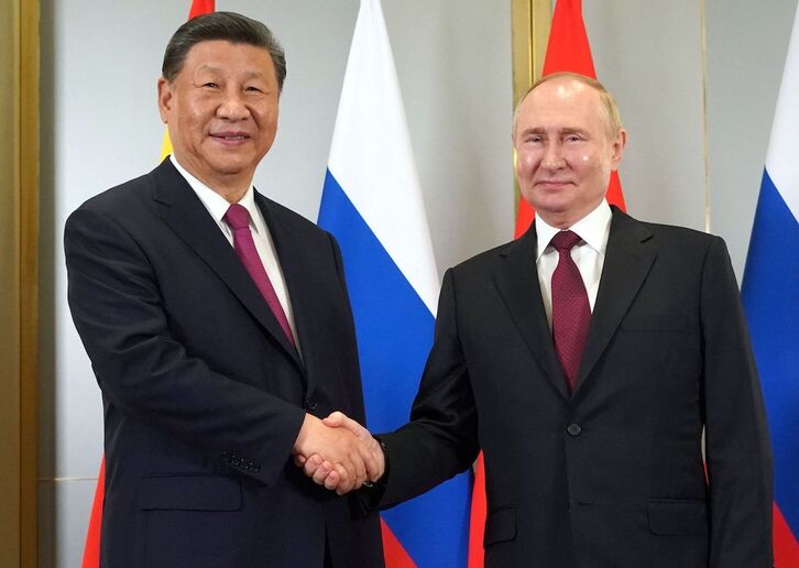    Los presidentes de China y Rusia, Xi Jinping y Vladimir Putin, respectivamente, ayer en Astaná, sede de la cumbre de la OCS.