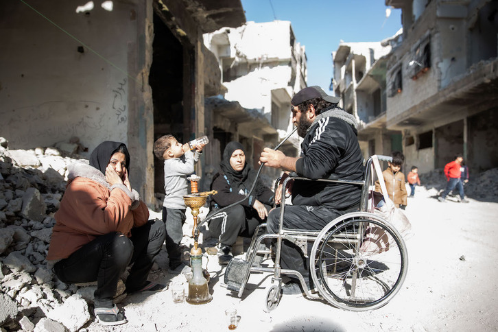 Una familia palestina, en el campo de Yarmuk, a las afueras de Damasco.